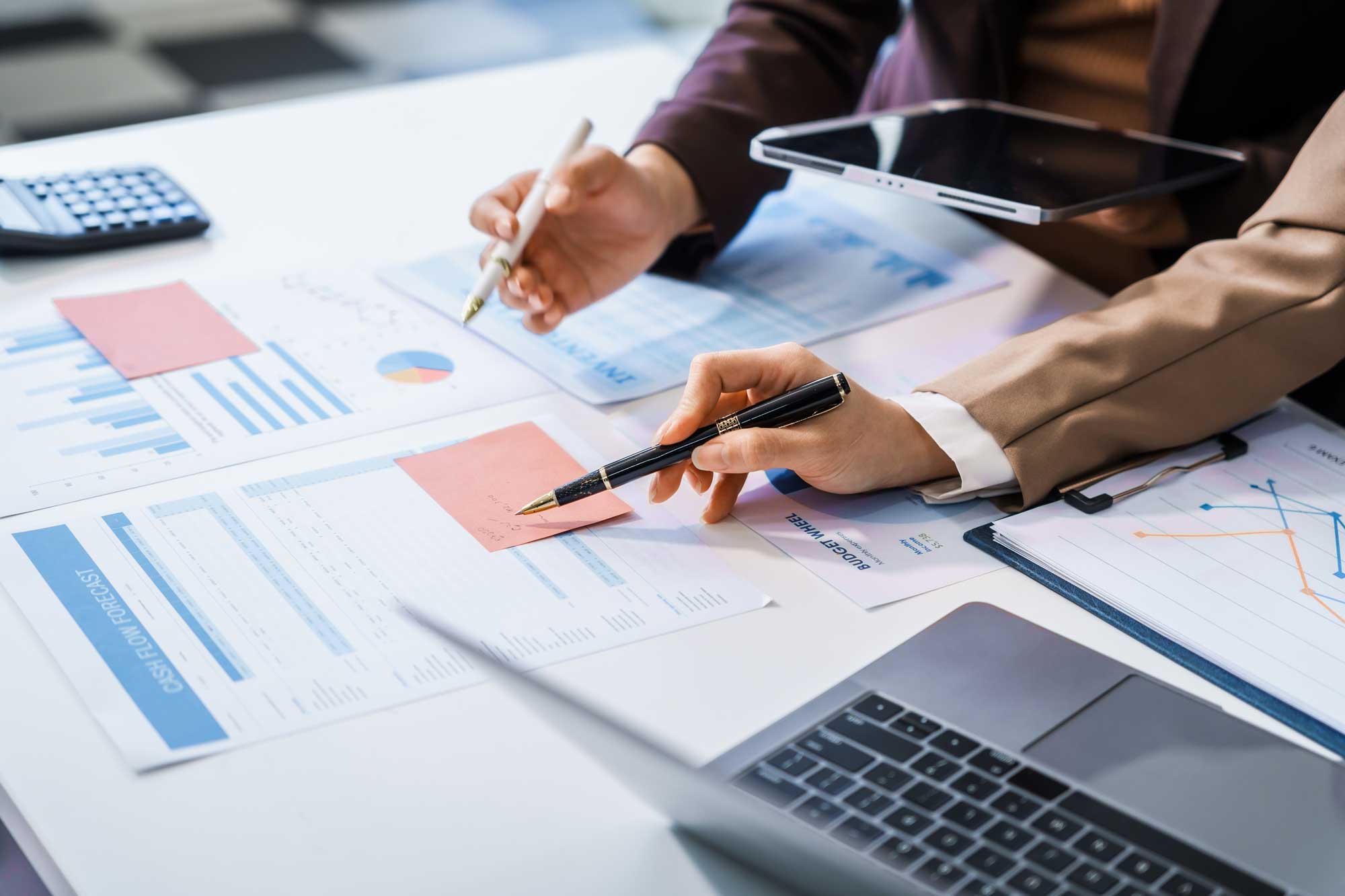 close-up-hands-financial-data